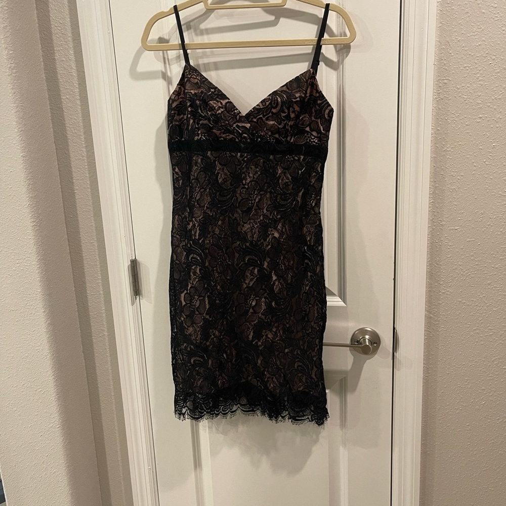 Bcbg Maxazria black lace with blush pink lining.